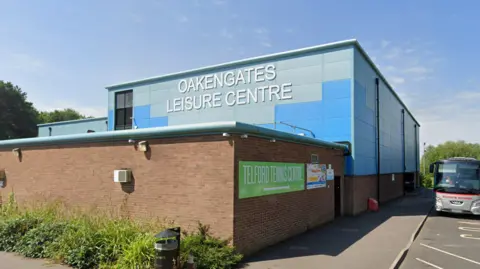 A blue building with the words "Oakengates leisure centre" on it