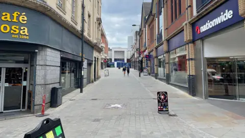 Virtually empty shopping street