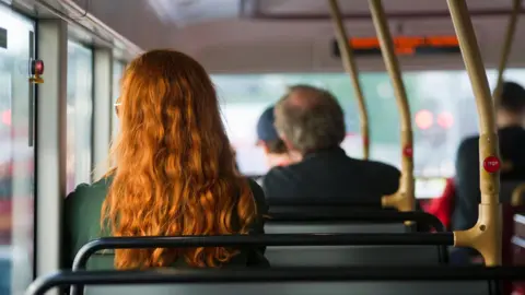 Getty Images Stock image of people sat on a bus in the UK