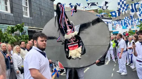 The Obby Oss parade in Padstow, 2024