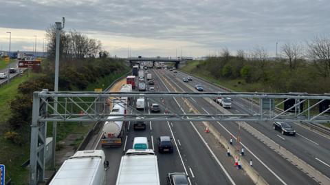 The southbound lane on the M1 is congested near junction 11A