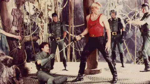 Getty Images Actors Sam J. Jones and Timothy Dalton in a fencing scene from the film Flash Gordon.