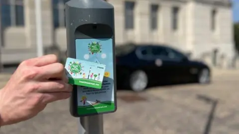 A Beat the Street sensor on a lamp post