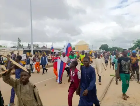 Saadu Labin Gusau Protesters waving Russian flags in Zamfara state 