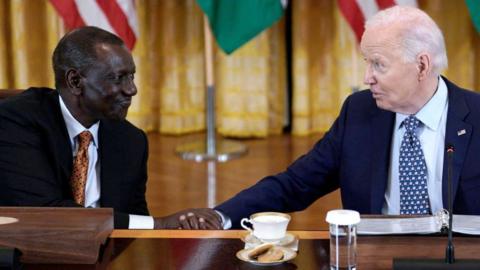US President Joe Biden greets Kenya's President William Ruto upon his arrival at the South Portico of the White House in Washington, DC on May 22, 2024.