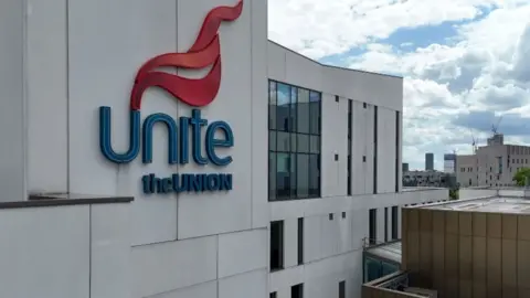 Unite the union sign on building