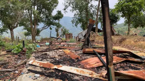 Aakriti Thapar/BBC Ruins of a burnt out military base qhiddqidduikhinv
