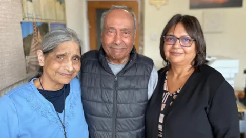 BBC Nirmal and Amar Nath with their daughter Suman Gupta who will be retiring on 31 March