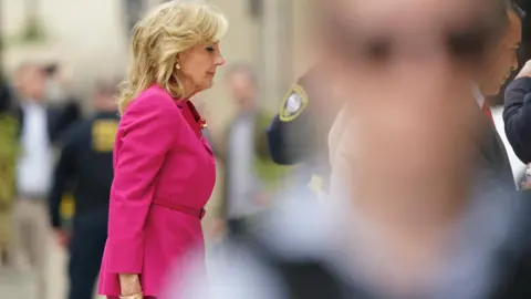 Reuters Jill Biden in pink suit, in profile