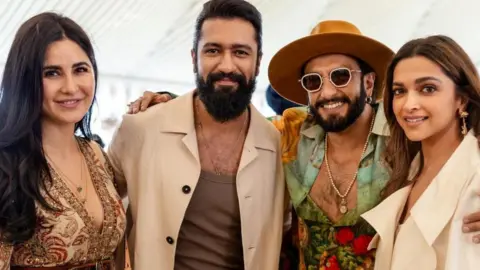 Reuters Actor Katrina Kaif, her husband and actor Vicky Kaushal, actor Ranveer Singh and his wife and actor Deepika Padukone pose during pre-wedding celebrations