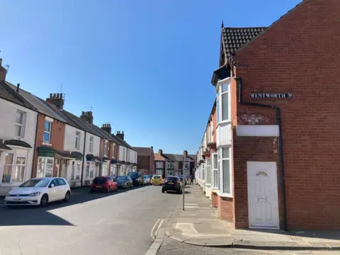 Daniel Hodgson/LDRS The outside of one of the property purchased by Creative Factory for artists. It sits on the corner of Princes Road and Wentworth Street and is a red-brick end of terrace with bay windows and a white door.