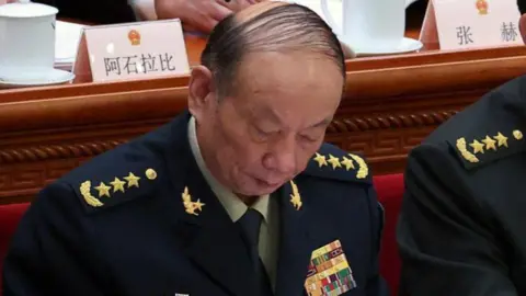 Reuters Central Military Commission (CMC) member Zhang Shengmin attends the opening session of the National People's Congress (NPC) at the Great Hall of the People in Beijing, China March 5, 2025. REUTERS/Florence Lo/File Photo