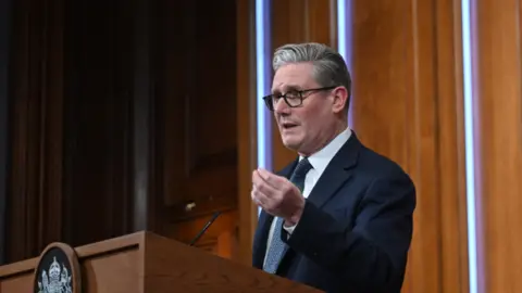 Prime Minister Sir Keir Starmer speaking during a press conference to give an update on the latest situation in the Middle East, in the Downing Street Briefing Room in London