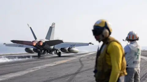 US Africa Command A photo, released by the US Africa Command, showing a fighter jet on a runway.