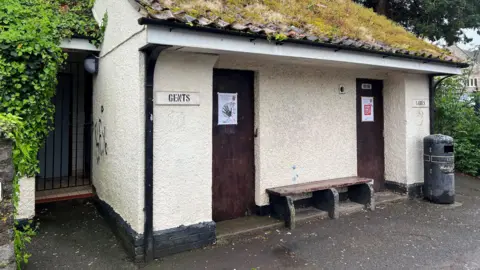 BBC Public toilet block with Gents and Ladies sign
