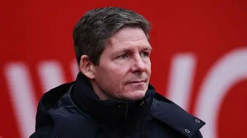 Oliver Glasner looks on thoughtfully