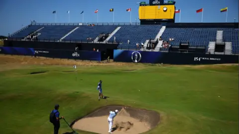 Reuters Royal Birkdale course with a large seating structure set up at the sidelines. 