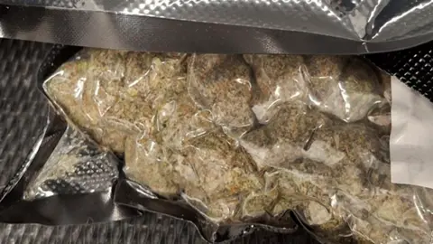 South West Regional Organised Crime Unit A vacuum sealed bag of cannabis concealed in another bag.