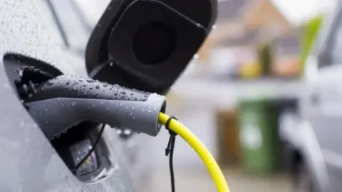 An electric car being charged.