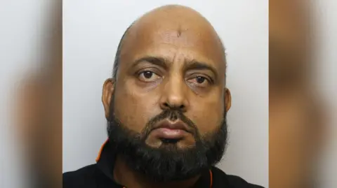 West Yorkshire Police Qadeer Hussain, 55,
