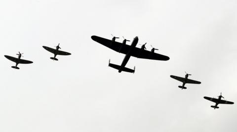 A silhouetted image of the Battle of Britain Memorial Flight 