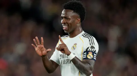 Real Madrid player Vinicius Jr celebrates