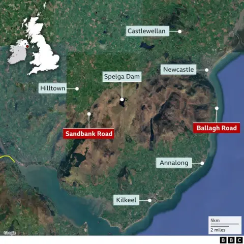 A map graphic showing the sites of the two large wildfires in the Mournes and Sandbank Road and Ballagh Road, in relation to nearby towns and villages including Hilltown, Newcastle, Castlewellan, Annalong and Kilkeel. 