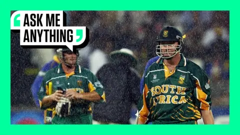 South Africa's Lance Klusener leaves the field in the rain
