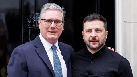 EPA British Prime Minister Keir Starmer (L) and Ukrainian President Volodymyr Zelensky pose for a photo at 10 Downing Street in London