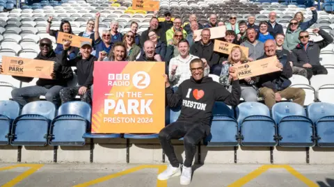 BBC Richie Anderson and music fans at Deepdale stadium