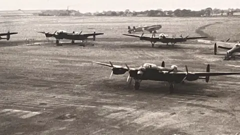 Avro Heritage Museum Photo of Woodford Aerodrome in WW2 with Lancaster Bombers on the air field 