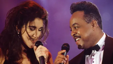 anadian singer Celine Dion and American R&B and soul singer and songwriter Peabo Bryson attend the 1992 Wolrd Music Awards ceremony in Monaco, May 14, 1992.