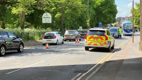 A4  London Road in Reading was blocked due to an accident. Photo of A4 London Road, cordoned off with a police car parked up.