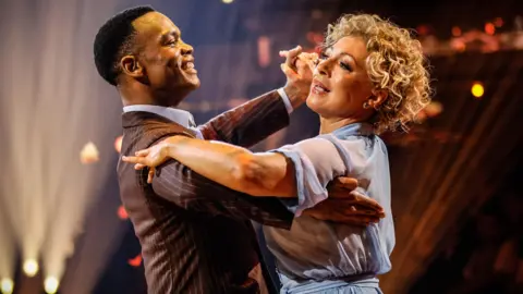 Johannes Radebe and Alex Kingston dancing on Strictly in 2025