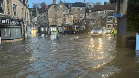 Bradford-on-Avon town centre is flooded with drivers trying to pass through the flood water.