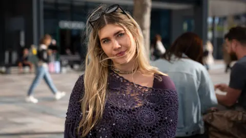 girl in Central Square Cardiff 