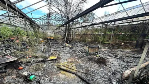 Ottery St Mary Fire Station Greenhouse fire in Ottery St Mary 