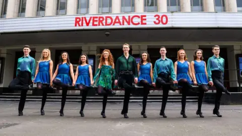 Getty Images LONDON, ENGLAND - MARCH 15: Amy-Mae Dolan and Fergus Fitzpatrick along with other dancers attend the Riverdance 30th Anniversary Tour photocall at the Eventim Apollo on March 15, 2024 in London, England. (Photo by Joe Maher/Getty Images)