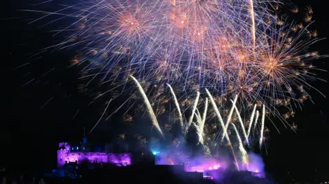 Fireworks in the sky above Edinburgh Castle