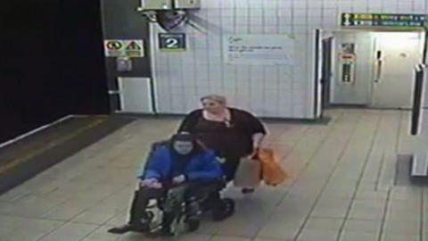 Jennifer Boyle pushes her son into Livderpool Central station