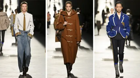 Victor VIRGILE/Gamma-Rapho via Getty Images Models on the runway at the Dries Van Noten fashion show as part of Paris Fashion Week Fall 2026 held Lycée Carnot on March 4, 2026 in Paris, France. 
