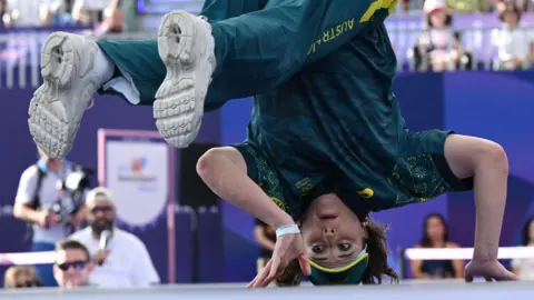 REUTERS Rachael Gunn, or Raygun, doing a headspin at the 2024 Olympics