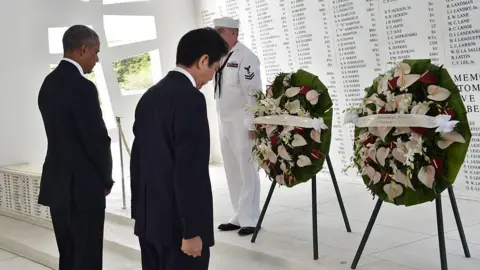 AFP via Getty Images US President Obama and Japan President Abe in front of a war memorial