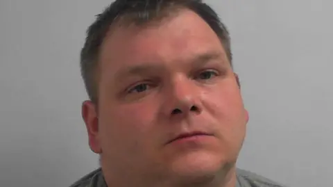 North Yorkshire Police Szczepan Zenon Malczewski has short blonde hair and a receding hairline