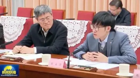 CCTV Image shows Liang Winfong attending a meeting chaired by Chinese Prime Minister Lee Qiang on January 20.