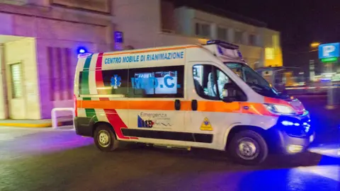 An ambulance seen outside Monaldi Hospital in Naples, Italy