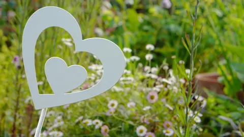 Acorn's Children's Hospice A white metal heart