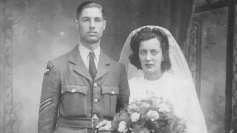 REG AND HEATHER LEA A black white wedding photo of Richard and Elizabeth Cheetham.