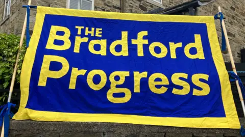 Olivia Richwald/BBC Bradford Progress banner hanging from wall