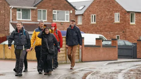 PA Figen Murray with others during the walk 